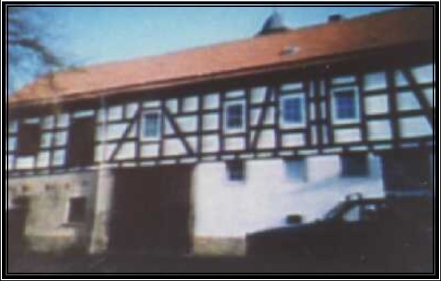 Altes Color-Foto eines Fachwerkhauses